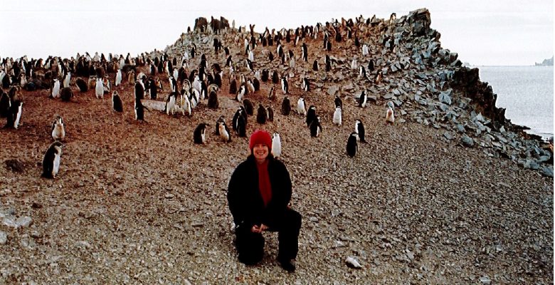 Sandi Davison and Chinstrap Penguins, Half Moon Island, Antarctica